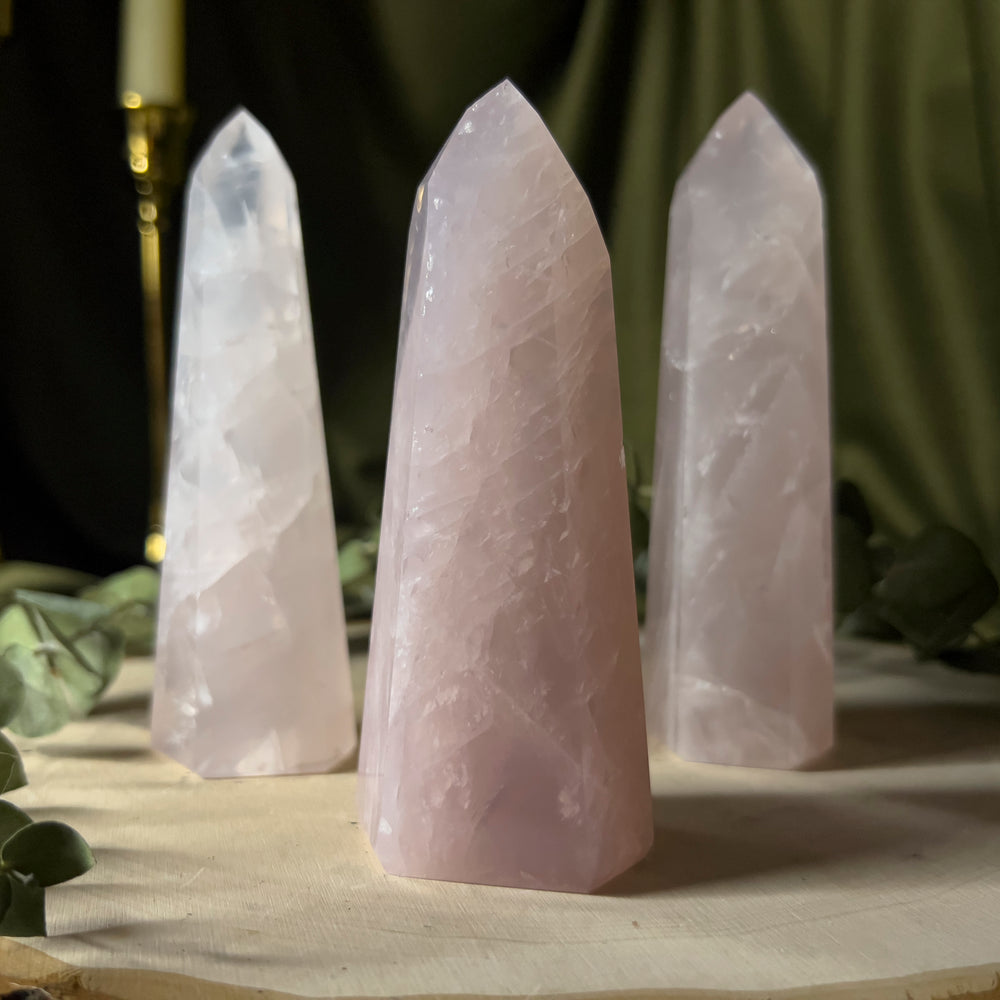 All three rose quartz towers standing with their light pink hue.