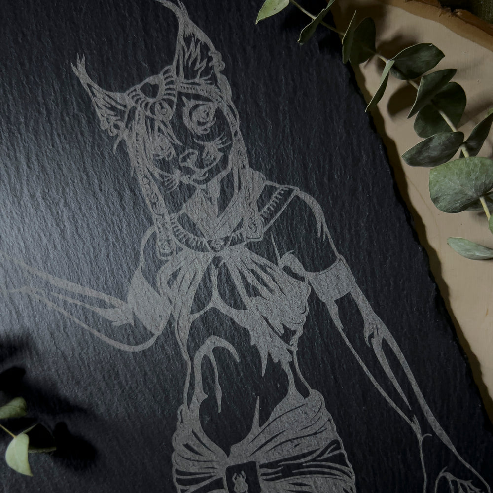 Goddess Bastet depicted on a slate art piece.